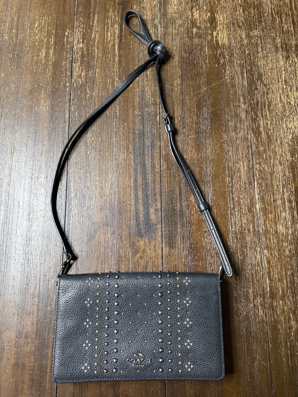 Coach Bandana Rivets Foldover Crossbody bag in polished pebble leather
